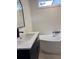 Modern bathroom with a sleek vanity and a freestanding bathtub at 2636 S Allen Dr # 2559 Accabee A & B, North Charleston, SC 29405