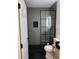 Modern bathroom features a glass shower with black trim and a sleek black vessel sink at 2636 S Allen Dr # 2559 Accabee A & B, North Charleston, SC 29405