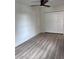 Empty bedroom boasts sleek floors and a ceiling fan for optimal comfort at 2636 S Allen Dr # 2559 Accabee A & B, North Charleston, SC 29405