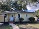 Charming one-story home with a well-maintained front yard and inviting walkway at 2636 S Allen Dr # 2559 Accabee A & B, North Charleston, SC 29405