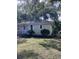 Cozy single-level home with manicured landscaping and shade trees on a green lawn at 2636 S Allen Dr # 2559 Accabee A & B, North Charleston, SC 29405