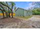 Backyard with green siding and an unfenced yard at 2647 Tillman St, North Charleston, SC 29405