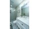 Bathroom featuring a white vanity with a marble countertop, and a tiled shower at 2647 Tillman St, North Charleston, SC 29405