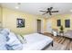 Inviting bedroom with a ceiling fan, decor, and accents for a cozy and stylish living space at 2647 Tillman St, North Charleston, SC 29405