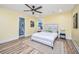 Serene bedroom with ceiling fan and decorative accents, creating a peaceful retreat within the home at 2647 Tillman St, North Charleston, SC 29405