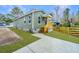Charming home with a cozy front porch and newly landscaped yard at 2647 Tillman St, North Charleston, SC 29405