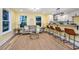 Stylish living room with cozy furniture and kitchen bar seating at 2647 Tillman St, North Charleston, SC 29405