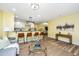Open-concept living room with bar seating and cozy furniture at 2647 Tillman St, North Charleston, SC 29405