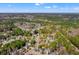 An aerial view of the property in a neighborhood featuring tree-lined streets and manicured lawns at 2900 Colonnade Dr, Mount Pleasant, SC 29466