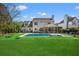 Backyard featuring a well-manicured lawn, pool and fence at 2900 Colonnade Dr, Mount Pleasant, SC 29466