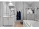 Bright bathroom with glass shower, tub, and dual sink vanity at 2900 Colonnade Dr, Mount Pleasant, SC 29466