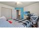 Well-lit bedroom featuring a ceiling fan, double closets, and a workspace for your convenience at 2900 Colonnade Dr, Mount Pleasant, SC 29466