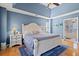 Spacious bedroom featuring a tray ceiling and private bathroom at 2900 Colonnade Dr, Mount Pleasant, SC 29466