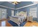Bedroom features a large bed, ceiling fan, and natural light at 2900 Colonnade Dr, Mount Pleasant, SC 29466
