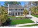 Charming two-story home with a double-decker porch and a well-maintained lawn at 2900 Colonnade Dr, Mount Pleasant, SC 29466