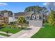 Charming two-story home featuring a double-decker porch, manicured lawn and a two car garage at 2900 Colonnade Dr, Mount Pleasant, SC 29466
