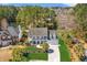 An aerial view showing lush landscaping, mature trees, and a tranquil pond view at 2900 Colonnade Dr, Mount Pleasant, SC 29466