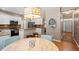 Bright eat-in kitchen with white cabinetry, stainless appliances, and granite countertops at 2900 Colonnade Dr, Mount Pleasant, SC 29466