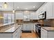 Updated kitchen with granite counters, stainless appliances, and modern cabinetry at 2900 Colonnade Dr, Mount Pleasant, SC 29466