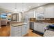 Kitchen with granite counters, a center island, stainless appliances, and sleek white cabinets at 2900 Colonnade Dr, Mount Pleasant, SC 29466