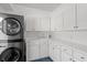 Laundry room with washer, dryer, white cabinets and countertop at 2900 Colonnade Dr, Mount Pleasant, SC 29466