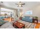 Open-concept living room with hardwood floors and kitchen view at 2900 Colonnade Dr, Mount Pleasant, SC 29466