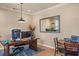 Well-lit home office space with hardwood floors, desk, and ample room for productivity at 2900 Colonnade Dr, Mount Pleasant, SC 29466