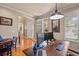 Spacious home office with hardwood floors, desk setup, and natural light at 2900 Colonnade Dr, Mount Pleasant, SC 29466