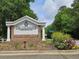 Community entrance sign with lush landscaping and clear signage at 2900 Colonnade Dr, Mount Pleasant, SC 29466