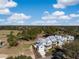 Beautiful aerial view of the homes showcasing their design, the surrounding trees, and manicured lawns at 3019 Eventide Dr, Johns Island, SC 29455