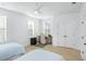 Bedroom featuring two twin beds, desk with chair, natural light, and hardwood floors at 3019 Eventide Dr, Johns Island, SC 29455