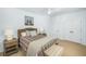 Bedroom with a wicker headboard, plaid accents, hardwood floors, and a ceiling fan at 3019 Eventide Dr, Johns Island, SC 29455