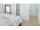 Bedroom featuring ensuite bathroom and modern furnishings and neutral decor at 3019 Eventide Dr, Johns Island, SC 29455