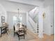 Elegant dining room features a classic chandelier and stylish table with seating for six at 3019 Eventide Dr, Johns Island, SC 29455