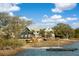 Charming cottage-style homes with waterfront access and a boat dock, ideal for enjoying lakeside living at 3019 Eventide Dr, Johns Island, SC 29455