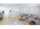 Bright, spacious living room with stylish decor, a plush sectional sofa and modern furniture at 3019 Eventide Dr, Johns Island, SC 29455