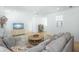 Comfortable living room with a ceiling fan, television and cozy sectional sofa at 3019 Eventide Dr, Johns Island, SC 29455