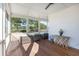 Cozy porch with comfortable seating, and beautiful views of the verdant surrounding landscape at 3019 Eventide Dr, Johns Island, SC 29455