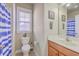 Cozy bathroom with vanity sink, toilet, and shower at 303 Crossandra Ave, Summerville, SC 29483
