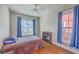 Bedroom with hardwood flooring, natural light, and storage at 303 Crossandra Ave, Summerville, SC 29483