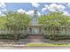 Community clubhouse featuring a welcoming entrance, elegant architectural details and an airy porch at 303 Crossandra Ave, Summerville, SC 29483