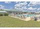 Resort-style community pool with ample seating, perfect for relaxation and summer fun at 303 Crossandra Ave, Summerville, SC 29483