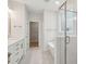 Spa-like bathroom with soaking tub, glass shower, and modern double vanity at 3148 Vanessa Lynne Ln, Johns Island, SC 29455