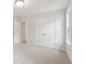 An airy bedroom with double closets and a window provides ample storage and natural light at 3148 Vanessa Lynne Ln, Johns Island, SC 29455