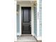 Close-up of a stylish black front door with a modern keypad at 3148 Vanessa Lynne Ln, Johns Island, SC 29455