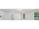 A well-lit living room boasts natural light with an open doorway, recessed lighting, and neutral paint at 3148 Vanessa Lynne Ln, Johns Island, SC 29455