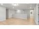 An open living room featuring wood grain flooring, neutral paint, recessed lights and an open floorplan at 3148 Vanessa Lynne Ln, Johns Island, SC 29455