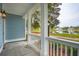Cozy front porch with views of the pond and community at 3148 Vanessa Lynne Ln, Johns Island, SC 29455