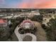 Majestic home with marsh views, sprawling grounds, and a circular driveway at sunset at 3232 Pignatelli Cres, Mount Pleasant, SC 29466