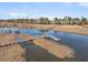 Beautiful aerial view of waterfront community showing private docks with access to waterway at 3232 Pignatelli Cres, Mount Pleasant, SC 29466